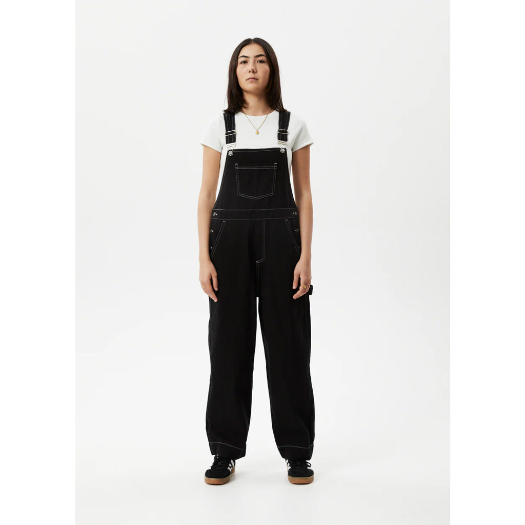 Afends Louis Organic Denim Baggy Overalls - Washed Black. Oversized Baggy Fit Overalls. Multiple Pockets. Adjustable Straps. Button-Up Sides 65% Organic Cotton - 35% Recycled Cotton Denim. Midweight, 8.5oz. Free NZ shipping. Shop Afends with Pavement skate store, Ōtepoti.
