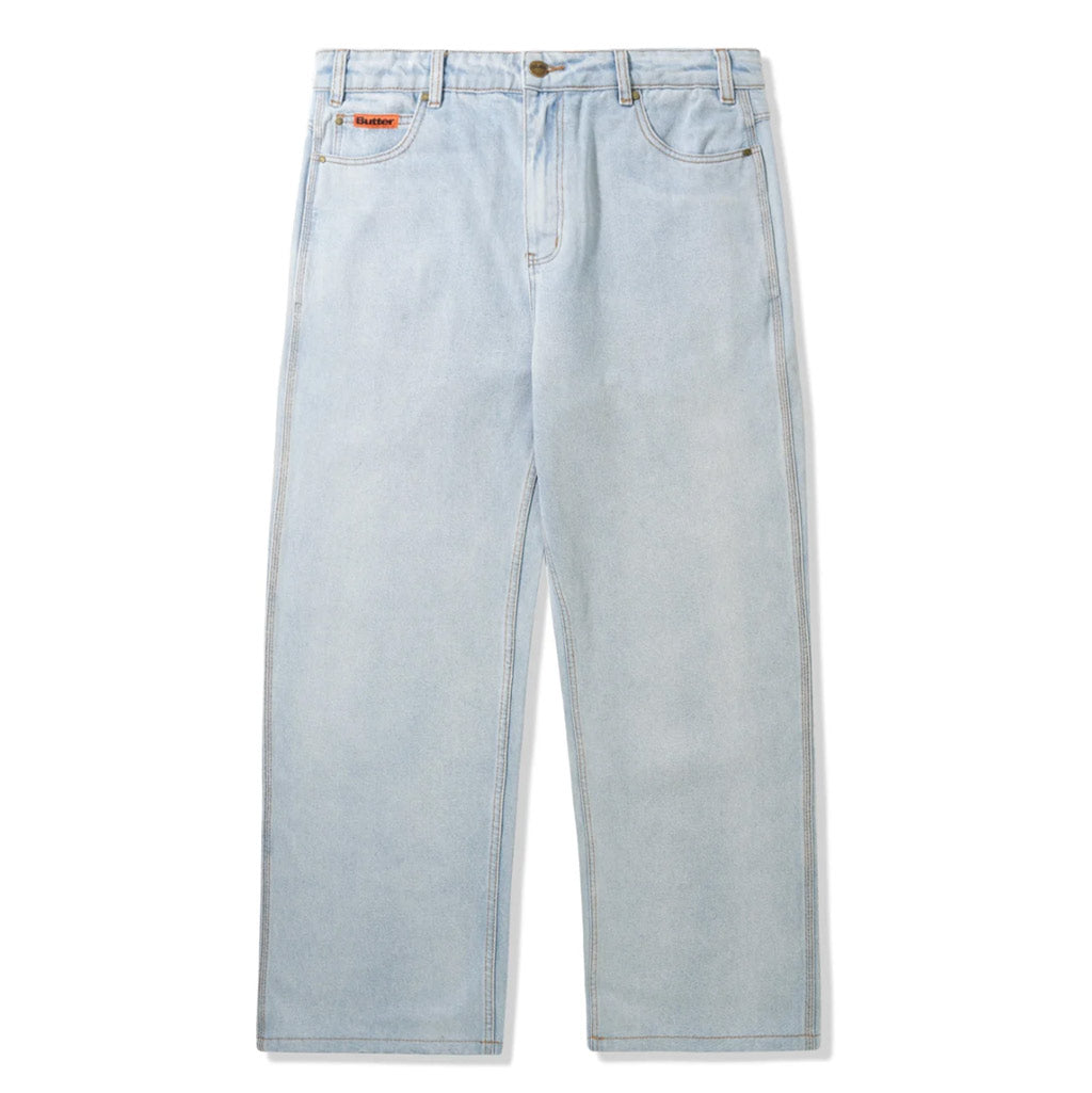 Butter Goods Baggy Denim Jeans - Light Blue. 100% Cotton relaxed fit denim jeans. Contrast gold stitching. Woven label on coin pocket & back pocket. Shop Butter denim jeans and shorts with Pavement skate store online. Free, fast NZ shipping over $150.