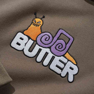 Butter Goods Snail Pullover Hood - Umber | Shop Butter Goods online with Pavement Skate Store and enjoy free Aotearoa shipping on orders over $100*!