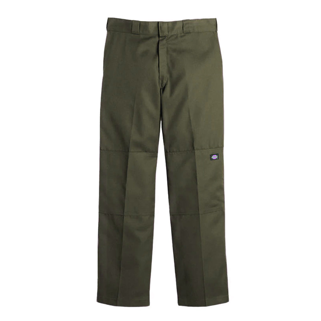 Dickies 85-283 loose fit double knee pant. Olive green. 65% Polyester 35% Cotton Twill. Straight wide leg, Centre crease, Double knee for durability. Tunnel belt loops. Easy-access multi-use pocket on right leg. Wrinkle resistant. Take advantage of Pavement skate shops free shipping in NZ today on all orders over $150.