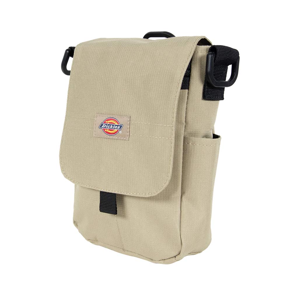 Dickies Baylor Ripstop Crossbody Bag - Desert Sand. 600D polyester. Cross body bag. Dickies logo patch to front. Velcro closure. Adjustable shoulder strap with snap & swivel buckles. Internal YKK zip closure. D-ring detail. Shop Dickies online with Pavement, free NZ shipping over $150, same day Dunedin delivery.