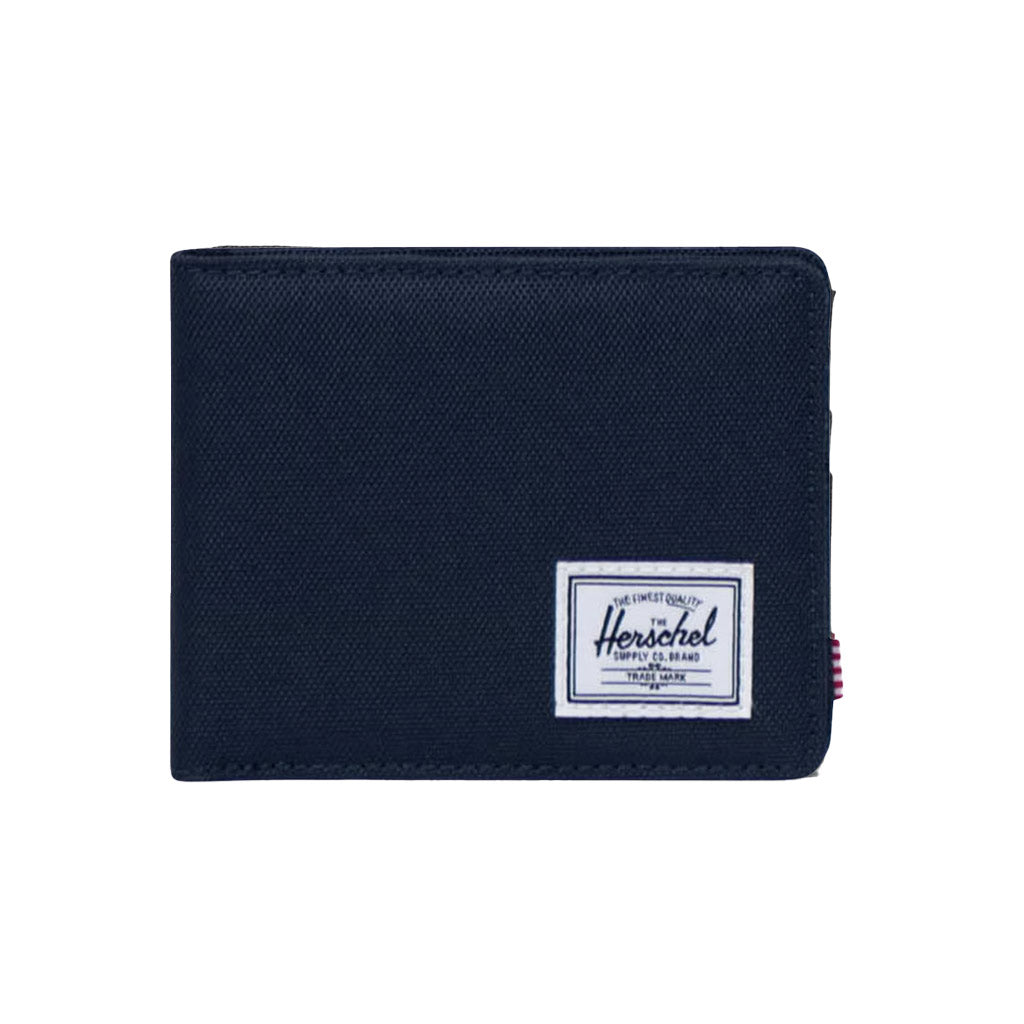 Herschel Roy Wallet - Navy. The classic wallet. The Roy is a folded wallet that opens to feature a currency sleeve and multiple card slots. 9cm (H) x 12cm (W) x 2cm (D). Shop wallets, backpacks and hip packs from Herschel online with Pavement, Dunedin's independent skate store. Free NZ shipping over $150.