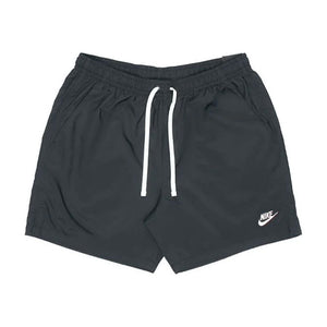 Nike Woven Flow Shorts - Black Whether you're running to the nearest food truck or diving into your favorite swimming hole, the Nike Sportswear Sport Essentials Lined Flow Shorts are a good idea. Semi-fitted. 100% Polyester. Style: DM6829-010. Shop Nike SB skate shoes, apparel and accessories online with Pavement.