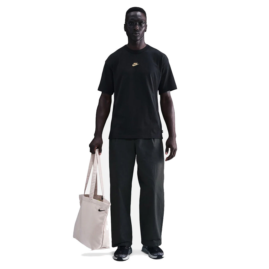 Nike Sportswear Premium Essential Tee in Black/Gold | Free Aotearoa NZ shipping on your Nike SB order over $100* when you shop with Pavement Skate Store!