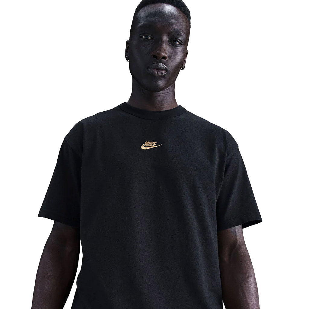 Nike Sportswear Premium Essential Tee in Black/Gold | Free Aotearoa NZ shipping on your Nike SB order over $100* when you shop with Pavement Skate Store!