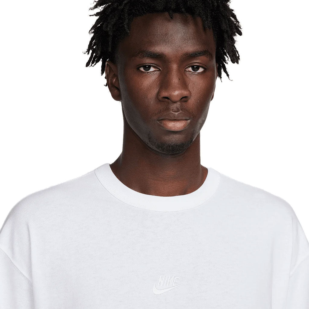Nike Sportswear Premium Essential Tee - White. Loose fit. Drop shoulders. Embroidered logo on chest. 100% cotton. Woven label on side. 100% Cotton. Shop Nike SB apparel, skate shoes and accessories with Pavement online. Free, fast NZ shipping over $150.