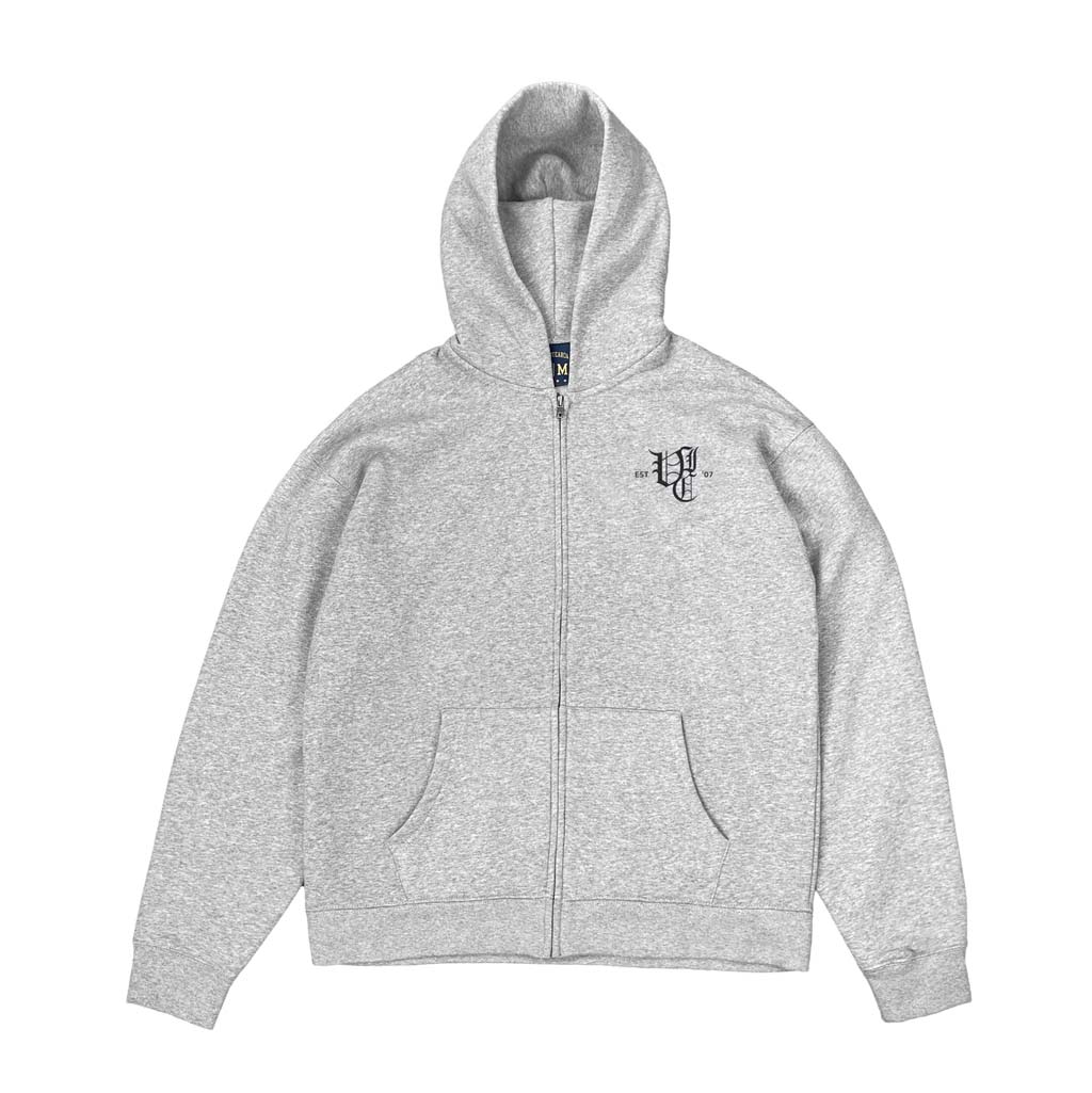 Vic Ol' English Zip Hood - Grey Marle. Relaxed & boxy fit. Dropped shoulder. Mid-weight, 320 GSM  80% Cotton 20% recycled polyester anti-pill fleece. Shop Vic Apparel premium streetwear and accessories online with Pavement, Dunedin's independent skate store, run by skaters. Free, fast NZ shipping over $150.