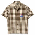 Xlarge Smile SS Shirt in Brown | Shop Xlarge clothing online with Pavement Skate Store with free Aotearoa NZ shipping on orders over $100*