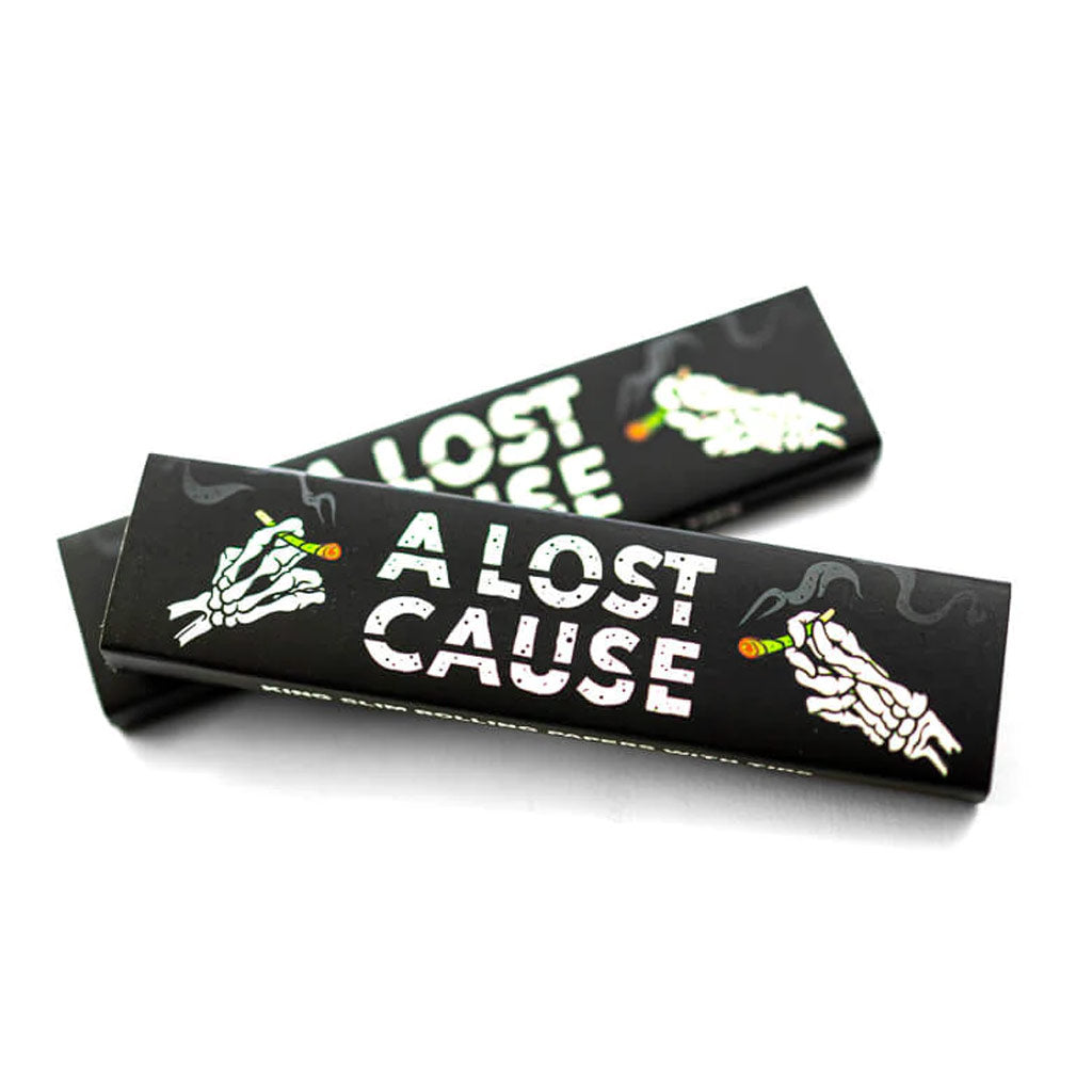 A Lost Cause Rolling Papers. King slim rolling papers w/ tips. Natural unbleached paper. Papers come as single packs. Enjoy free shipping in NZ on all ALC orders over $100 at Pavement Skate Shop Ōtepoti. 