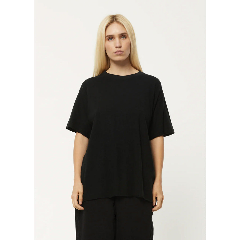 Afends Slay Hemp Oversized Tee - Black. Womens Hemp Oversized Tee. 55% Hemp 45% Organic Cotton Jersey. Shop women's hemp clothing essentials from Afends and enjoy free shipping across Aotearoa on your orders over $100. Pavement skate shop, Ōtepoti.