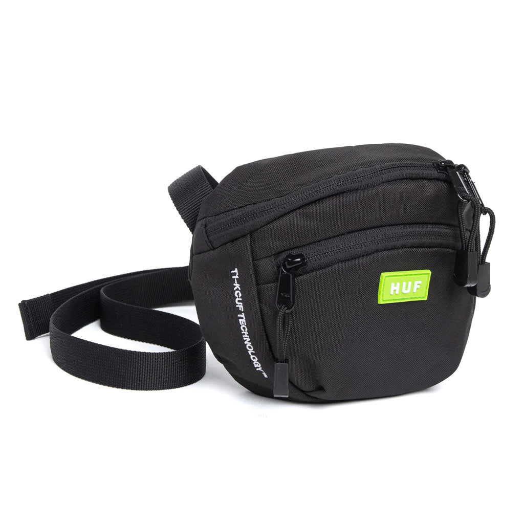 Huf Bunker Shoulder Bag - Black The Bunker Shoulder Bag is a city-smart pack perfect for quick commutes and weekend getaways. A spacious main compartment and front zip pocket secure your goods when you’re on the go, while an adjustable strap can be secured across the chest or slung at the side for close-fitting comfort