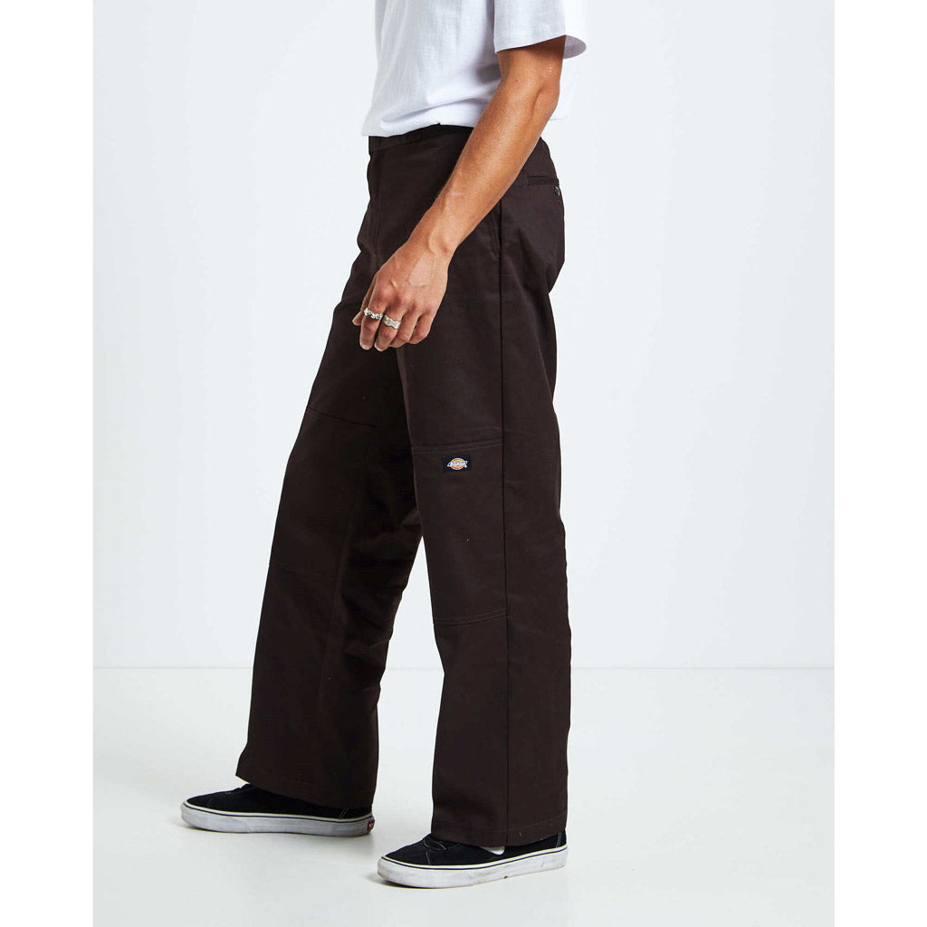 Dickies 85-283 Loose Fit Double Knee Pant - Dark Brown. 8.5 OZ 65% Polyester 35% Cotton Twill. Shop Dickies iconic pants. Free N.Z shipping on orders over $100. Pavement skate shop, Ōtepoti.