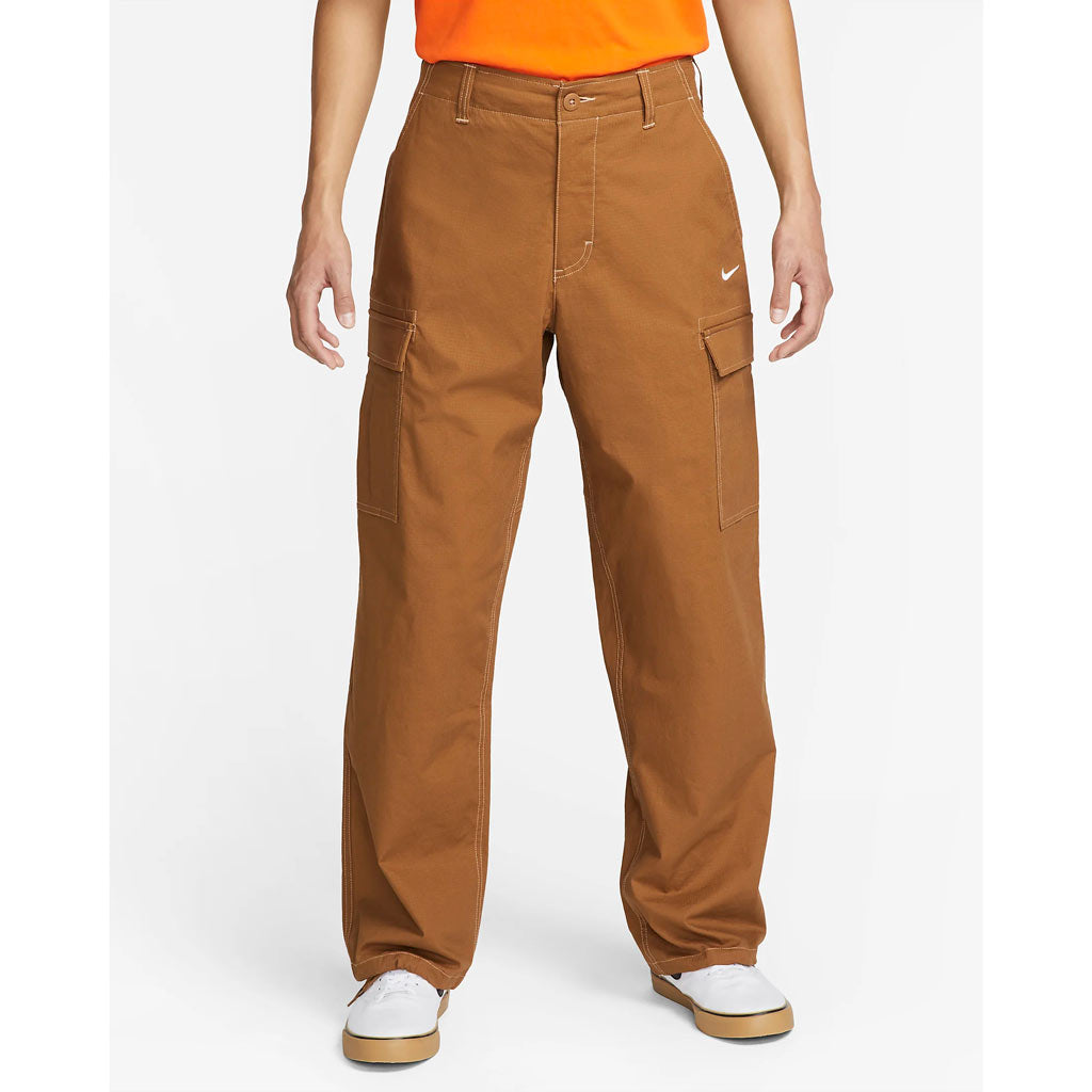 Nike SB Kearney Cargo Pant - Ale Brown/White. The classic cargo made from durable ripstop fabric in a roomy, skate-ready fit, these Nike SB pants are built to last. 97% cotton/3% spandex. Style: FD0401-270. Enjoy free shipping on your Nike SB orders over $100 with Pavement, Dunedin's independent skate shop.
